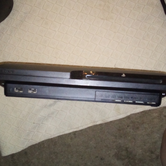 PS3 SLIM 360MB: BARELY USED, 2 controllers, wand, camera, 12 games. - Picture 3 of 4